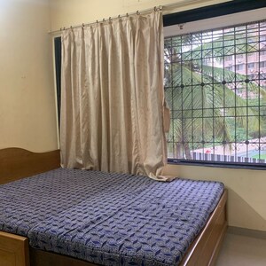 Bedroom in 1 BHK Apartment at Shree Pancham CHS, Vazira – for Rent