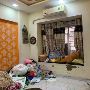 Living Room in 1 BHK Apartment at Shree Mangirish CHS, Shimpoli – for Rent