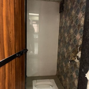 Bathroom in 1 BHK Apartment at Shree Mangirish CHS, Shimpoli – for Rent