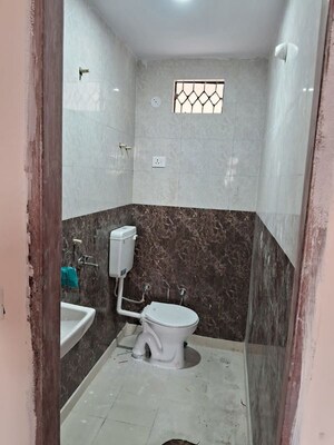 Bathroom in 2 BHK Apartment at Mahavir Enclave 1 – for Rent