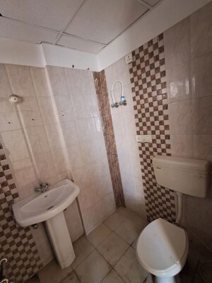 Bathroom in 2 BHK Apartment at Dragon Age The Citadel, Chinhat – for Rent