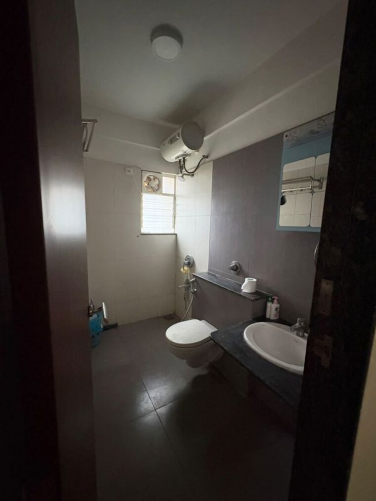 Bathroom, gera-song-of-joy 2 Bedroom 860 Sq.Ft. Apartment In Kharadi Pune 10502903