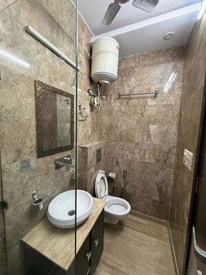 Bathroom in 2 BHK Builder Floor at Kalkaji – for Rent