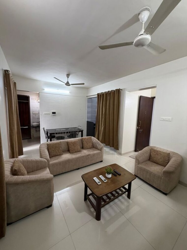 Living Room, sai-innovision-7-avenues 2 Bedroom 1200 Sq.Ft. Apartment In Balewadi Pune 10503063