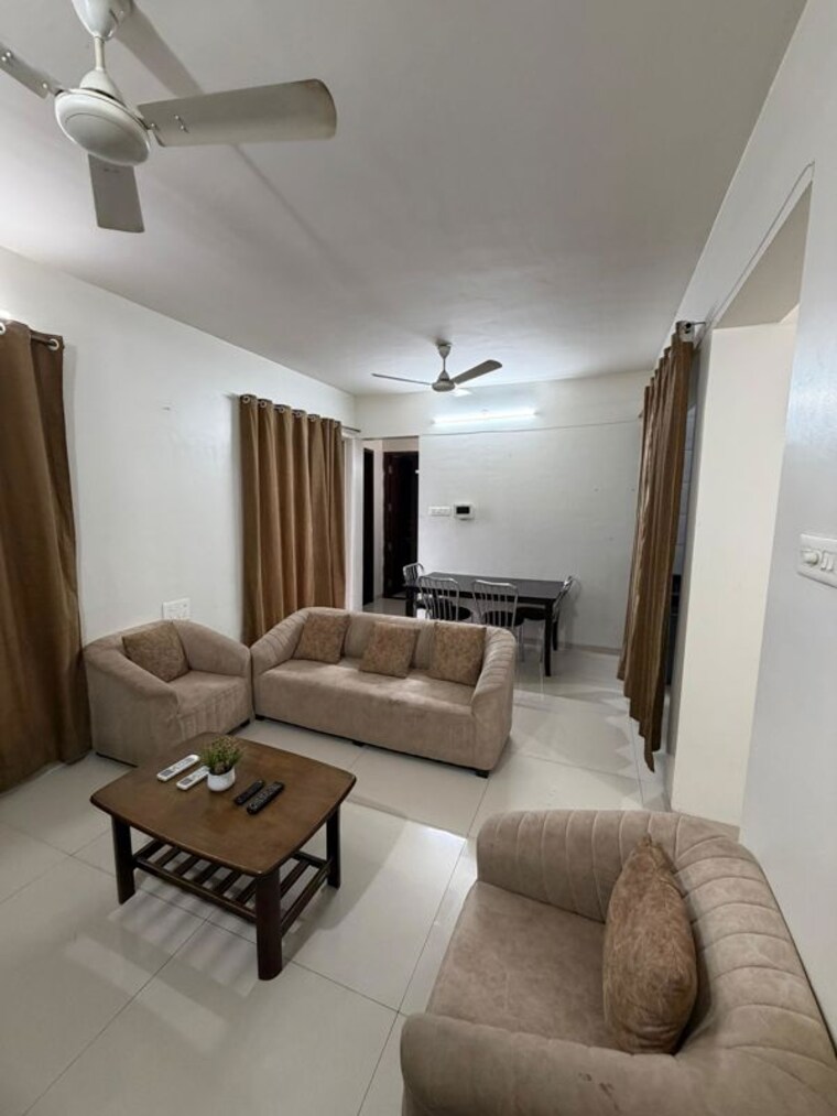 Living Room, sai-innovision-7-avenues 2 Bedroom 1200 Sq.Ft. Apartment In Balewadi Pune 10503063