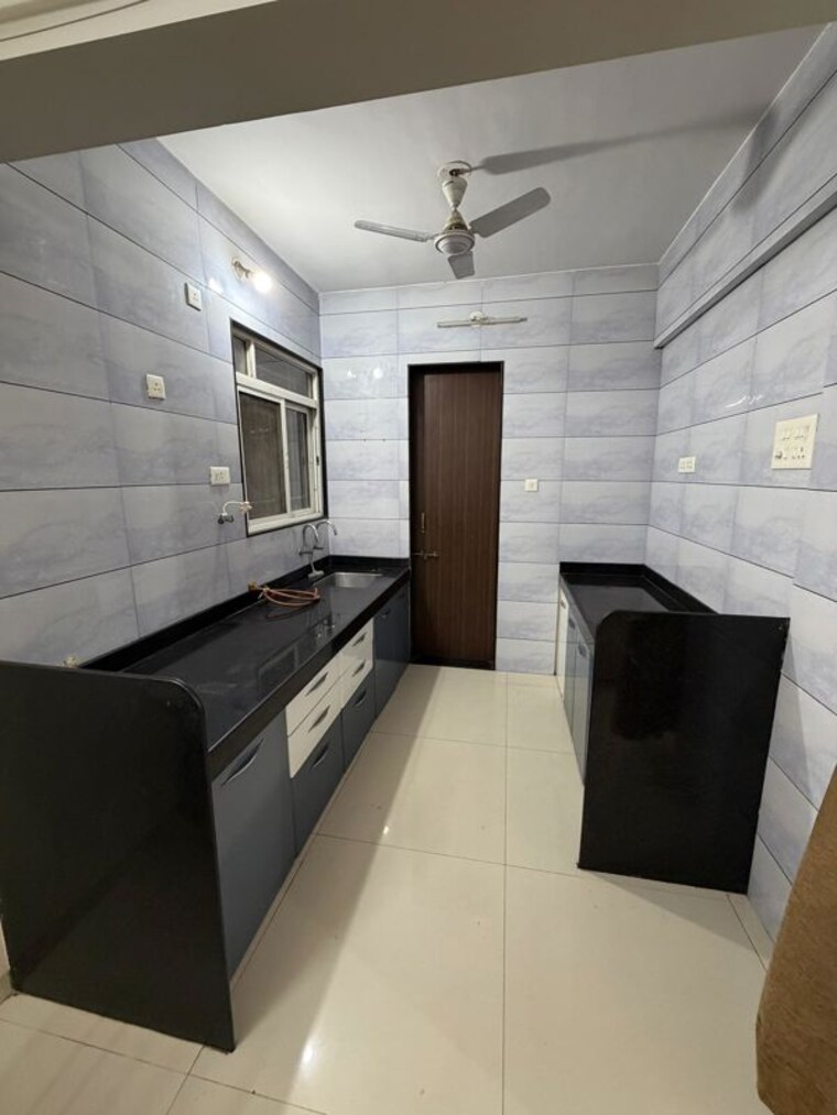 Kitchen, sai-innovision-7-avenues 2 Bedroom 1200 Sq.Ft. Apartment In Balewadi Pune 10503063