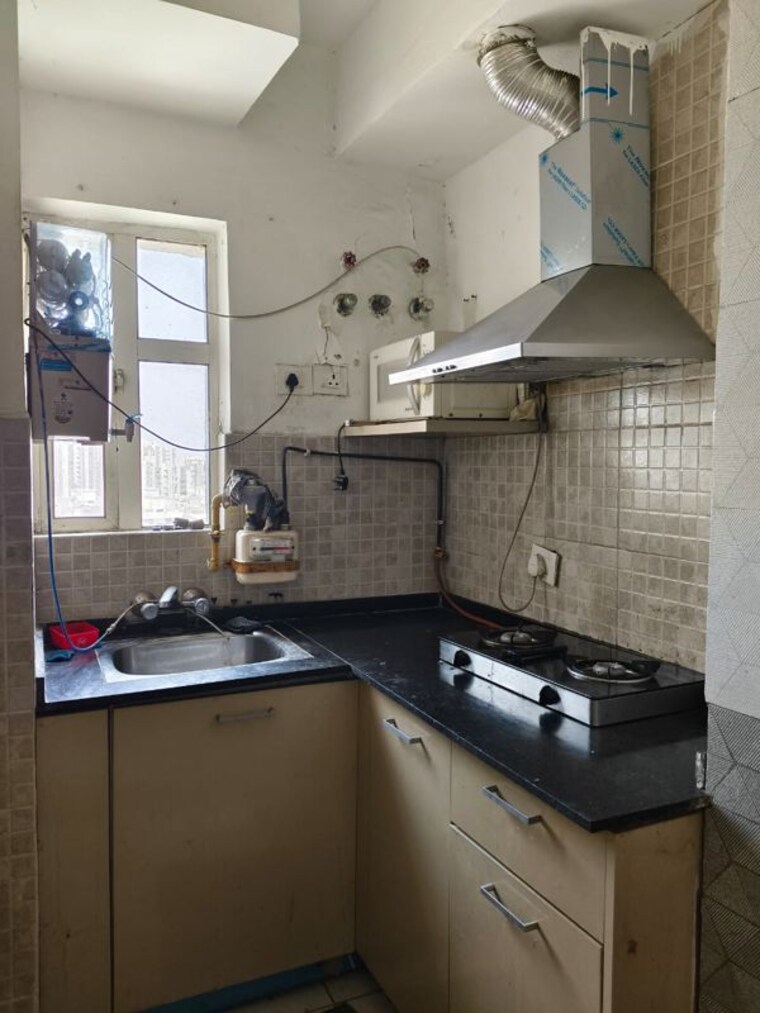 Kitchen, paras-tierea 1 Bedroom 495 Sq.Ft. Apartment In Sector 137 Noida 10493538