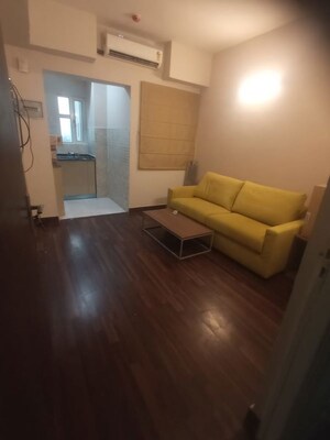 Living Room in 1 BHK Apartment at Paras Tierea, Sector 137 – for Rent