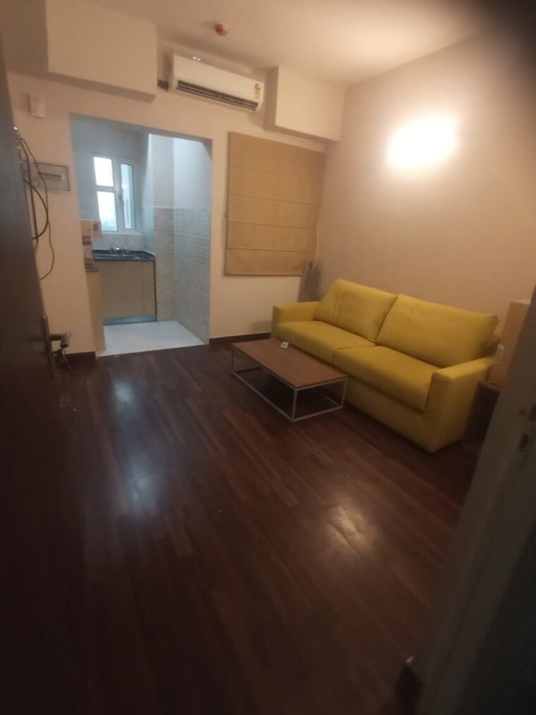 Living Room, paras-tierea 1 Bedroom 495 Sq.Ft. Apartment In Sector 137 Noida 10493538