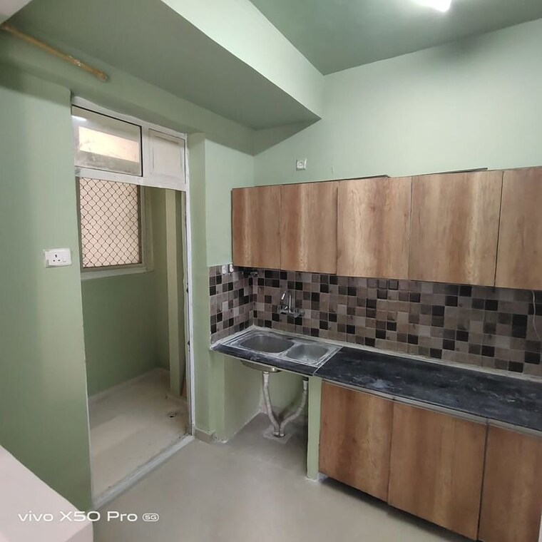 Kitchen, prateek-grand-city 2 Bedroom 770 Sq.Ft. Apartment In Siddharth Vihar Ghaziabad 10503208