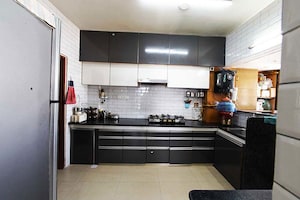 Kitchen in 3 BHK Apartment at Ghatlodia – for Sale