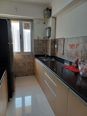 Kitchen in 2 BHK Apartment at Atul Blue Fortuna, Andheri East – for Rent