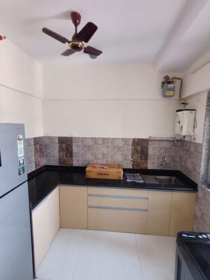 Kitchen in 2 BHK Apartment at Atul Blue Fortuna, Andheri East – for Rent