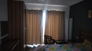 Living Room in 1 RK Apartment at Paramount Golf Forest Studio Apartments - OAK Towe, Zeta I Greater Noida – for Rent