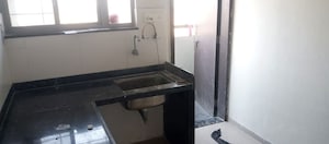 Kitchen in 1 BHK Builder Floor at Mantra City 360, Talegaon Dabhade – for Sale