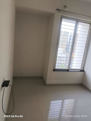 Room in 2 BHK Apartment at Pharande Kairosa, Punawale – for Rent