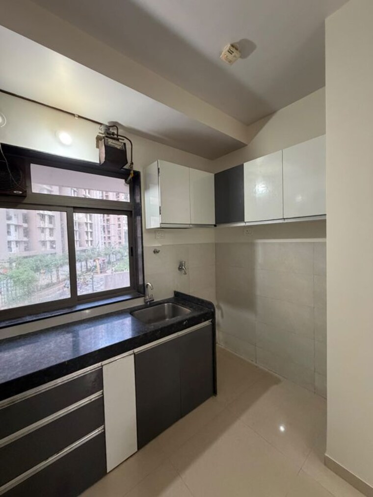 Kitchen, lodha-luxuria 2 Bedroom 750 Sq.Ft. Apartment In Majiwada Thane 10503348
