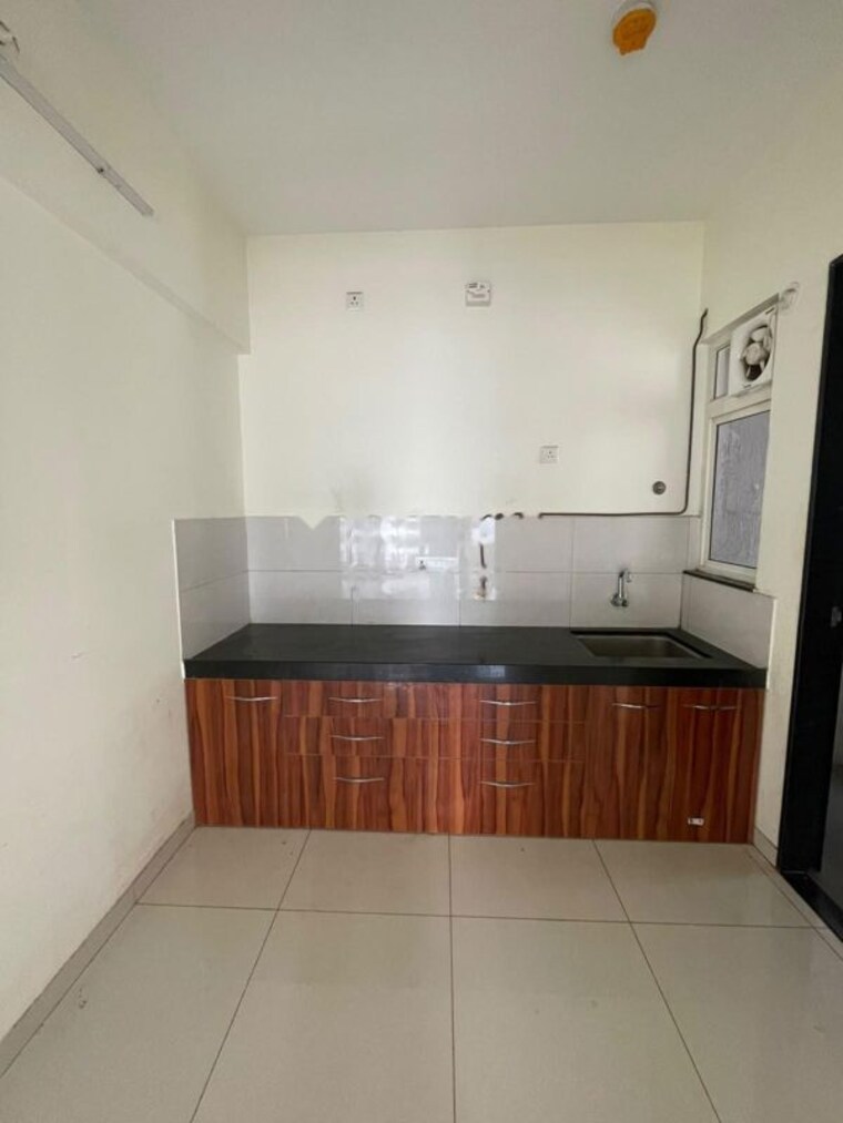 Kitchen, kolte-patil-r10 2 Bedroom 819 Sq.Ft. Apartment In Hinjewadi Pune 10503477