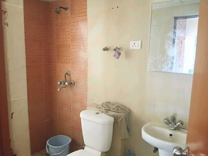 Bathroom in 2 BHK Apartment at Mahagun My Woods, Sector 16c Greater Noida – for Rent