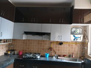 Kitchen in 2 BHK Apartment at Mahagun My Woods, Sector 16c Greater Noida – for Rent