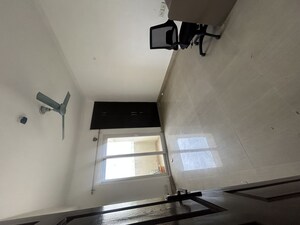 Staircase in 2 BHK Apartment at Paramount Floraville, Sector 137 – for Rent