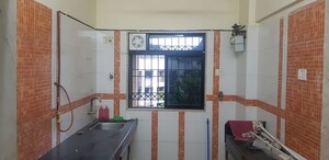 Kitchen in 2 BHK Apartment at Shiv Parvati, Malad West – for Rent
