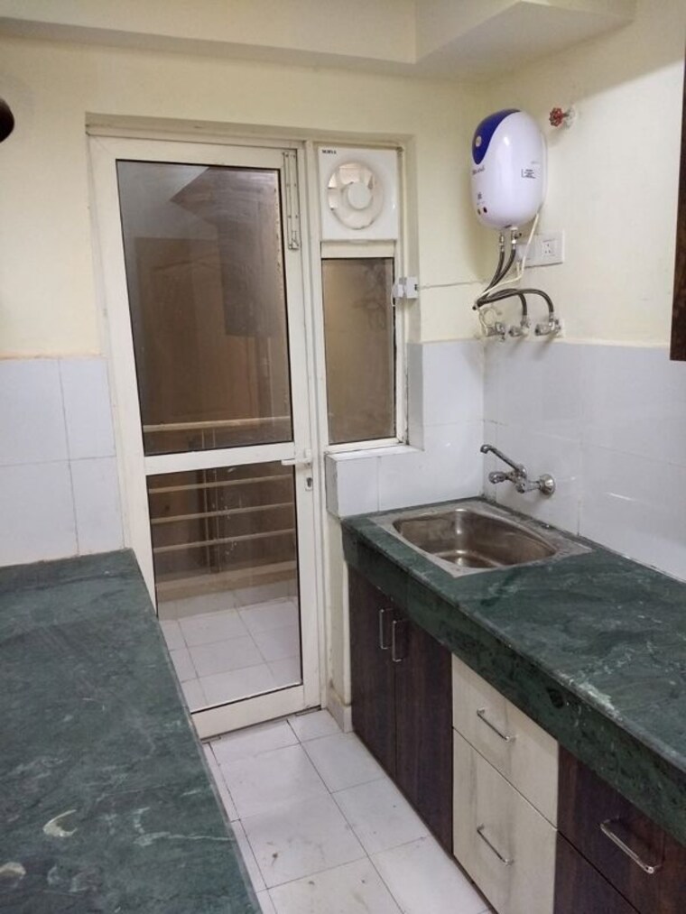 Kitchen, paras-tierea 3 Bedroom 1410 Sq.Ft. Apartment In Sector 137 Noida 10503752