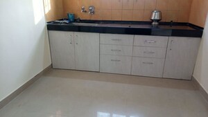 Kitchen in 1 BHK Apartment at Magarpatta City Heliconia, Hadapsar – for Rent