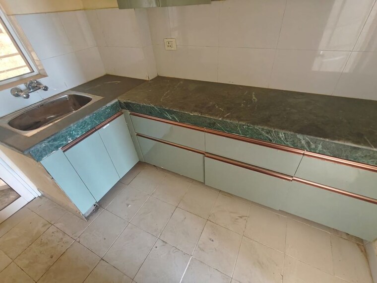 Kitchen, paras-tierea 3 Bedroom 1580 Sq.Ft. Apartment In Sector 137 Noida 10503886