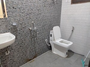 Bathroom in 2 BHK Builder Floor at Chattarpur – for Rent