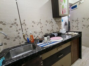 Kitchen in 1 BHK Apartment at Andheri Green Field Towers, Jogeshwari East – for Rent