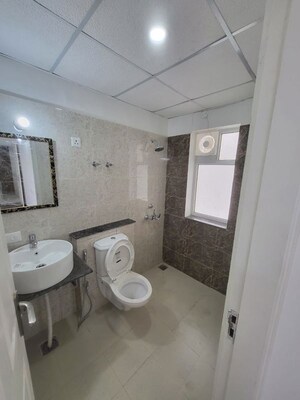 Bathroom in 2 BHK Apartment at Sushma Joynest ZRK, Ghazipur – for Rent