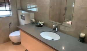 Bathroom in 4 BHK Apartment at Godrej Tropical Isle, Sector 146 – for Sale
