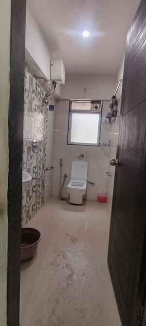 Bathroom in 2 BHK Apartment at Atharva CHS Goregaon East, Goregaon East – for Rent