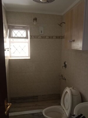 Bathroom in 2 BHK Apartment at Malviya Nagar – for Sale