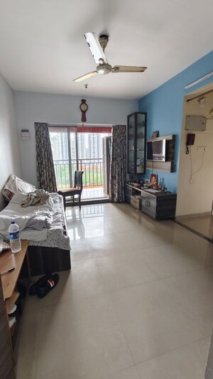 Living Room in 1 BHK Apartment at Kalpataru Hills, Manpada – for Sale