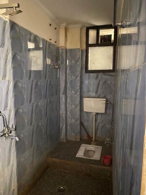 Bathroom in 1 BHK Builder Floor at Chattarpur – for Sale