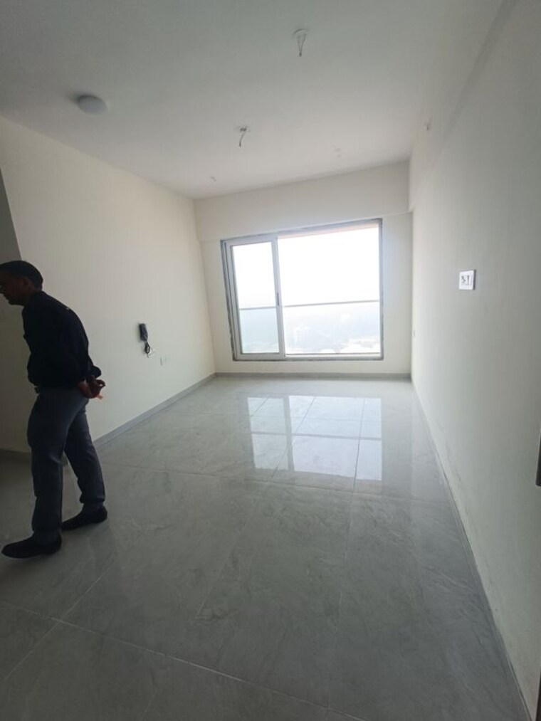 Living Room, bharat-arize 2 Bedroom 815 Sq.Ft. Apartment In Goregaon West Mumbai 10504187