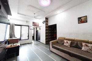 Living Room in 2 BHK Apartment at Ghatlodia – for Sale