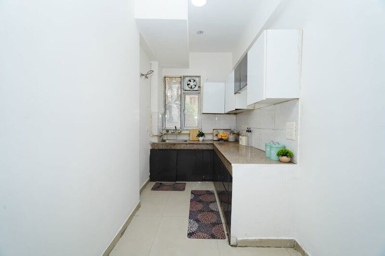 Kitchen, sam-palm-olympia-phase-second 3 Bedroom 1335 Sq.Ft. Apartment In Sector 16c Greater Noida Greater Noida 10504382