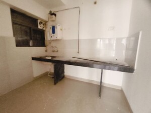 Kitchen in 2 BHK Apartment at Amit Colori Homes, Undri – for Rent