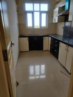Kitchen in 3 BHK Apartment at Dhanuka Sunshine Symphony, Ajmer Road – for Sale