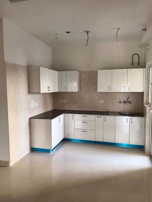 Kitchen in 3 BHK Apartment at Samridhi Luxuriya Avenue, Sector 150 – for Rent