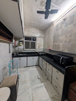 Kitchen in 1 BHK Apartment at Rajshree CHS, Andheri East – for Rent