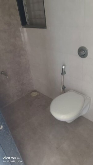 Bathroom in 1 BHK Apartment at Romell Orbis, Andheri East – for Sale