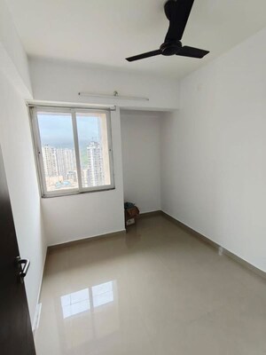 Bedroom in 2 BHK Apartment at Puranik Tokyo Bay Phase 3A, Kasarvadavali – for Rent