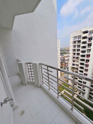Balcony in 2 BHK Apartment at Urban Axis Urban Woods, Sushant Golf City – for Sale