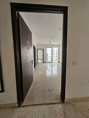 Building Lobby in 2 BHK Apartment at Urban Axis Urban Woods, Sushant Golf City – for Rent