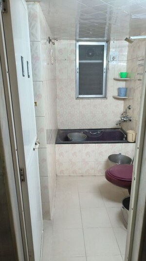 Bathroom in 2 BHK Apartment at Shiv Ganga CHS, Santacruz East – for Sale