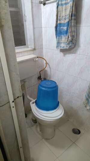 Bathroom in 2 BHK Apartment at Shiv Ganga CHS, Santacruz East – for Sale